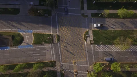 Top-Down View of Road Intersection in Late Afternoon Light Video stock 348236119