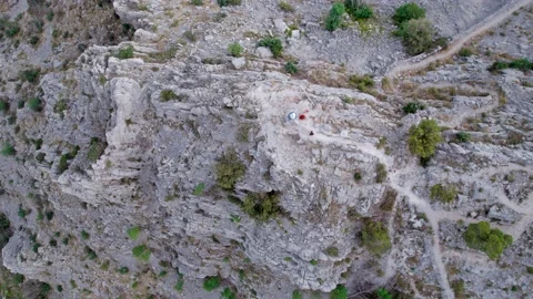 Top down view of the rock hill at the sea coast, 4k Stock Footage 204075844