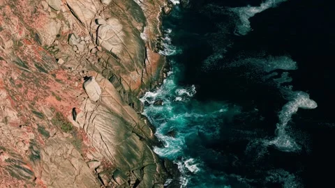 Top-down view of rocks and surf, Chapman's Peak coastline Stock Footage 339185104