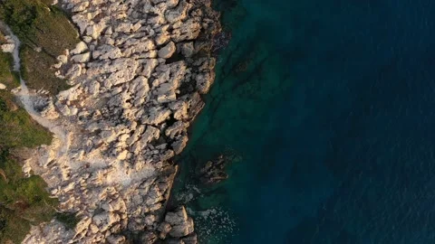 Top down view of rocky coast of Aegean sea Vídeo Stock 236765164