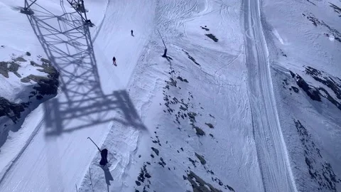Top Down View Of Rocky Snowy Mountain With People Skiing Stock Footage 237338089
