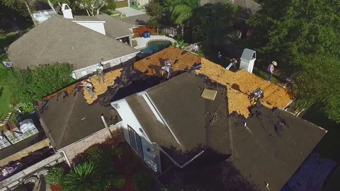 Top Down View Roof Being Replaced Large Suburban Home Shingles Drone 動画素材 85393569