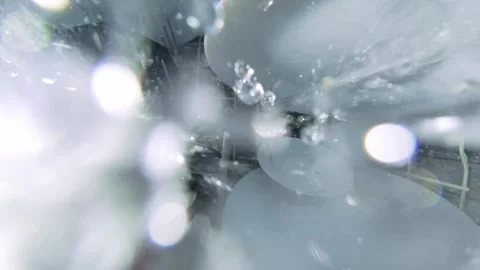 Top Down View from Rotating Arm Inside Dishwasher with Water Spray 库存影片 334311110