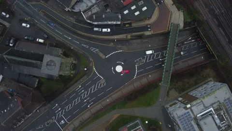 Top Down View of Roundabout on Uk Roads With Traffic Stock Footage 183601598