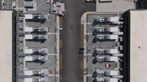 Top down view of rows of industrial power generation units at a data center Stock-Footage 336519537