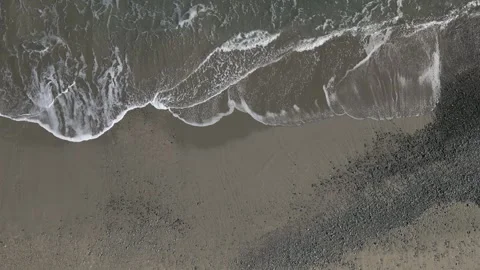 Top down view of sea waves crashing on the shore, Shizuoka, Japan Stock Footage 325832493