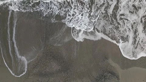 Top down view of sea waves crashing on the shore, Shizuoka, Japan Stock Footage 325832495