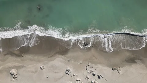 Top down view of sea waves crashing on the shore, Aichi, Japan Stock Footage 325832957