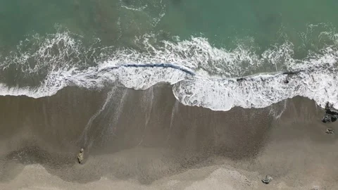 Top down view of sea waves crashing on the shore, Aichi, Japan Stock Footage 325833015