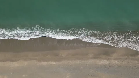 Top down view of sea waves crashing on the shore, Aichi, Japan Stock Footage 325833268