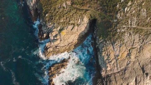Top Down View Of Seascape And Cliffs In Cabo de San Adrian - drone shot Stock Footage 243008867