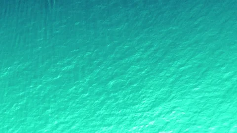 A top-down view of shimmering turquoise water Stock Footage 284367625