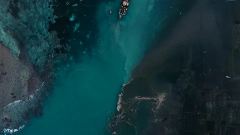 Top down view on ship delivering internet to island Stock Footage 160037255