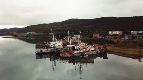 A top down view of a ships and vessels in a port or pier at Petropavlovsk Video stock 121613372