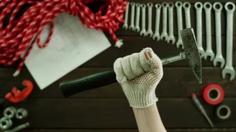 Top down view. Showing a hammer Stock Footage 80118848