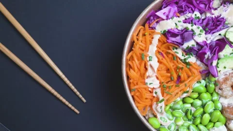 Top Down View of Shrimps Poke Bowl on Black Background Stock Footage 306669783