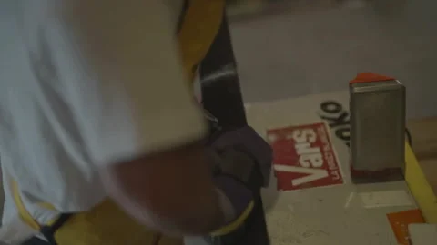 Top-down view of ski being brushed Video stock 345804585
