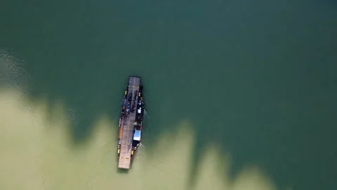 Top down view of a small ferry crossing the Danube 動画素材 342427884
