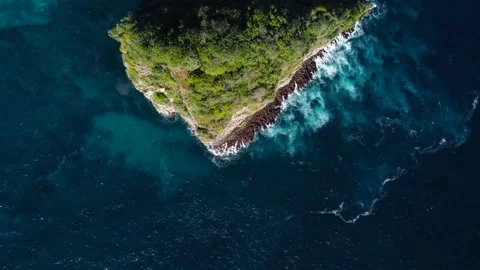 Top down view on small island in azure ocean Stock Footage 161782587
