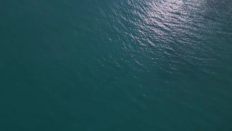 Top Down View of Sparkling Turquoise Ocean Water Surface Background 動画素材 340392985