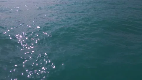 Top Down View of Sparkling Turquoise Ocean Water Surface Background Vídeo Stock 340393169