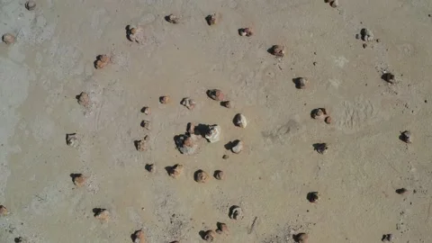 Top down view of spiral rock formation. Aerial rotating pull back drone Stock Footage 230573862