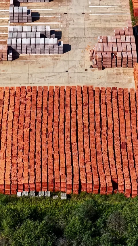 Top Down View of Stacked Red Clay Bricks on Pallets at Brick Factory Storage Stock Footage 346575606