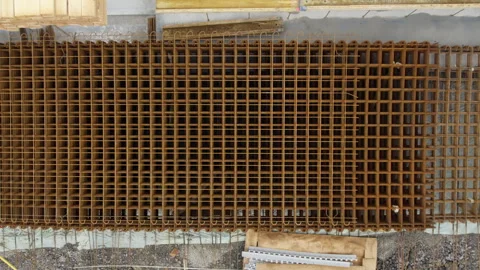 Top-Down View of Stacked Reinforcement Mesh Panels at Construction Site Stock Footage 336270395