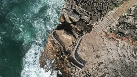 Top down view of stairs towards Boca do Inferno attraction Stock Footage 220860279