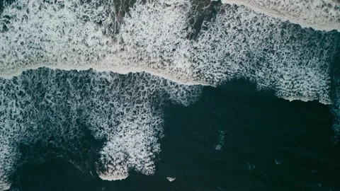 Top down view of storm waves with foam and surf ocean waves Nova Scotia Canada Stock Footage 255392215