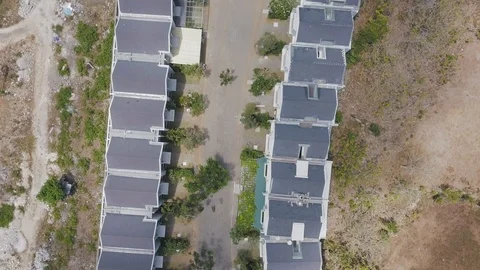 Top down view on the street of the cottage along the street aerial footage Stock Footage 100637437
