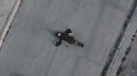 Top down view of stylish young woman on city street Stock Photos