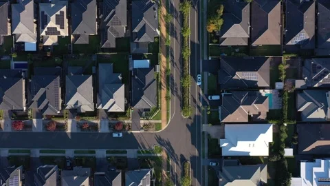 Top down view of suburban streets with modern brick veneer homes, Australia 動画素材 276515429