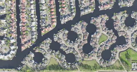 Top down view of symmetrical pattern of leisure housing in a harbour in Lemmer Stock Footage 240328302