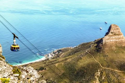 Top down view from Table Mountain of a cable car and the Lion's Head on the r Stock Photos