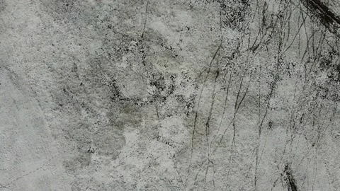 Top Down View Texture Aerial of Snowy Pasture and Fence Line Stock Footage 197184081