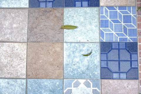 A top-down view of a tiled surface Photos