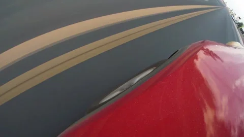 A top down view of tire driving along a road on a warm morning sunrise. Stock Footage 342574177