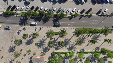 Top down view tourists walk on sidewalk ... | Stock Video | Pond5