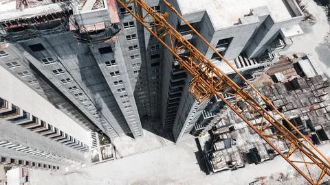 Top Down View Of Tower Crane Over High Rise Building Under Construction Fotos de archivo