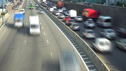 Top down view of a traffic in the city. Avenue Time-Lapse, Day. Sun. highway Vídeo Stock 92367732