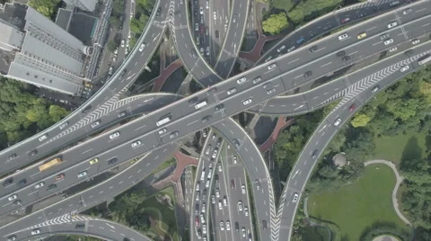 Top down view of traffic driving over busy intersection in Shanghai, China Stock Footage 67529877