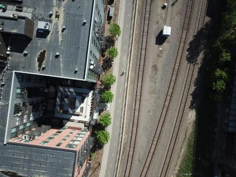 Top down view of train tracks and urban building Stock Photos