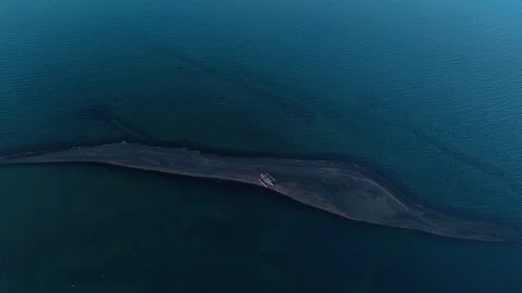 Top down view of tropical sandbar and traditional boat in crystal clear water Stock Footage 337415071