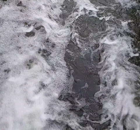 Top-down view of turbulent river current with white foam, square 1:1 b-roll Stock Footage 336896473