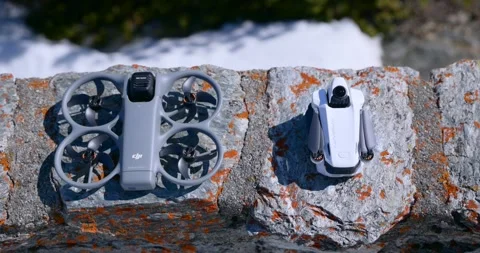 Top Down View of Two Drones on Stone Wall Stock Footage 343928144