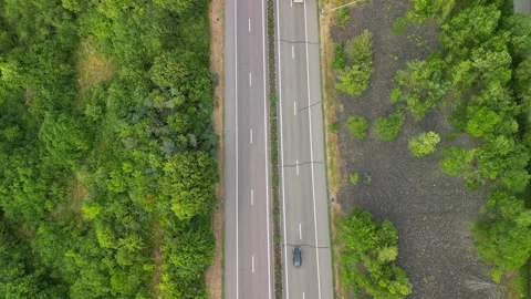 Top down view of a two lane highway Stock Footage 246374137