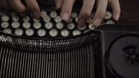 Top Down View of Typing on a Typewriter Stock Footage 259415906