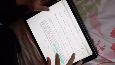 Top Down View - University Student Studying Math Formulas on Tablet Computer Stock Footage 104477175