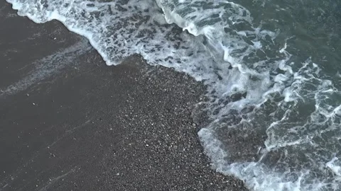 Top down view video of the water waves on Mediterranean sea beach. Stock Footage 338314106